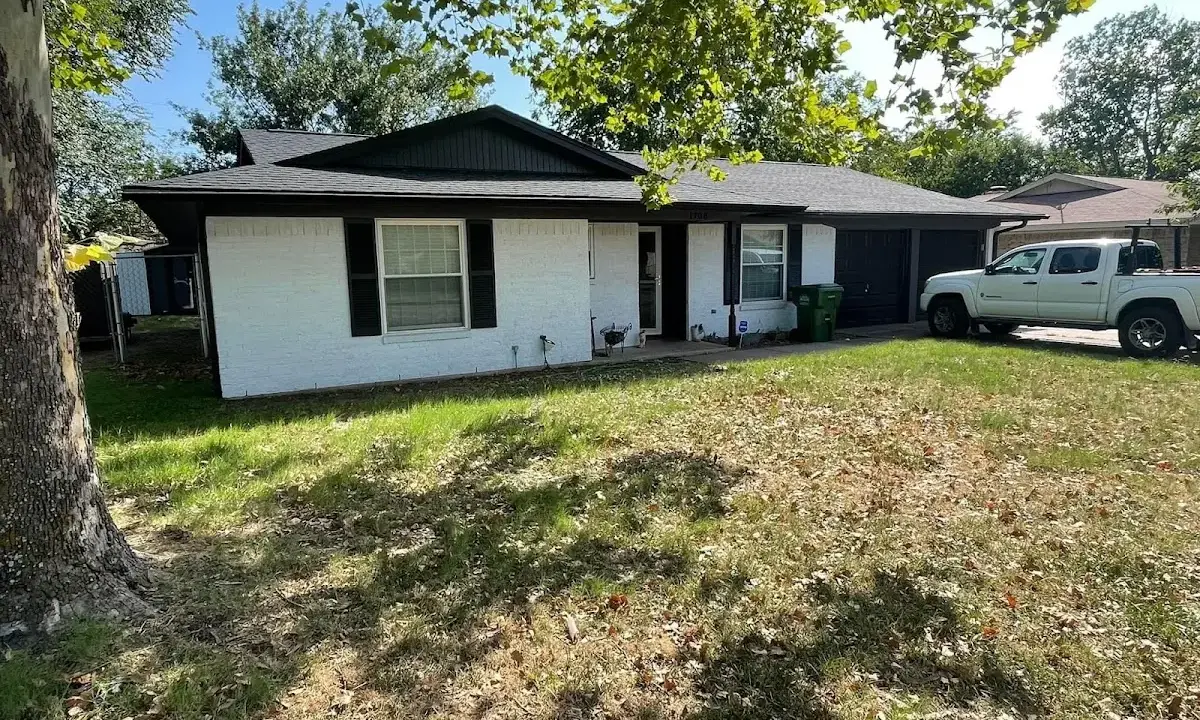 Professional roofing crew working on a residential roof in Oro Valley